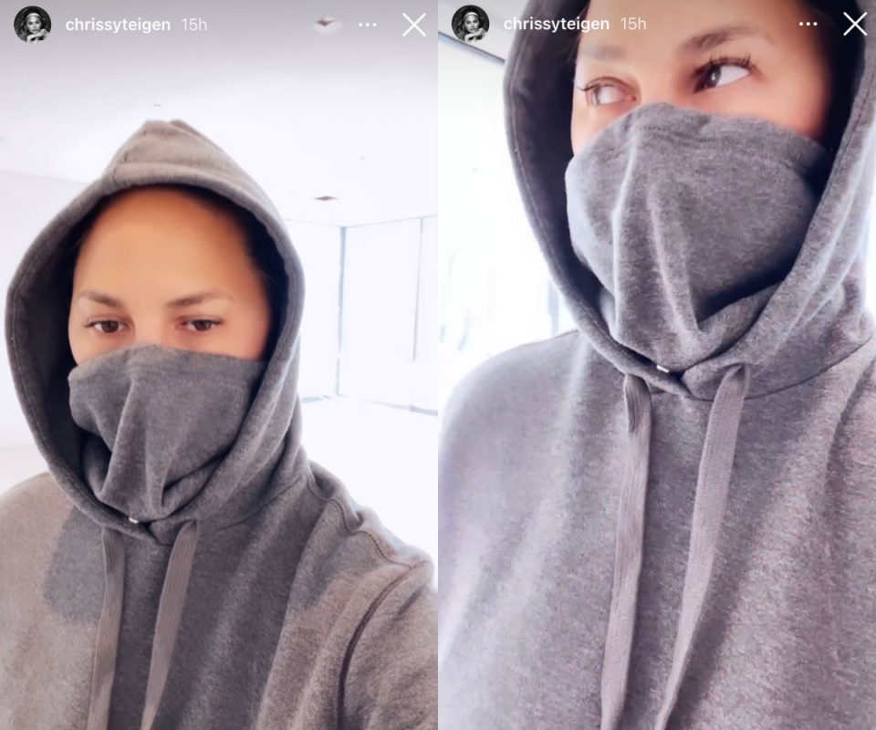 Chrissy Teigen's comfy grey hoodie featured a built-in face mask. Images via Instagram/ChrissyTeigen.