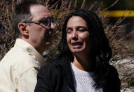 <p>A pedestrian, who police say was a witness to a van striking multiple people at a major intersection in Toronto’s northern suburbs, reacts in Toronto, Ontario, Canada, April 23, 2018. (Photo: Carlo Allegri/Reuters) </p>