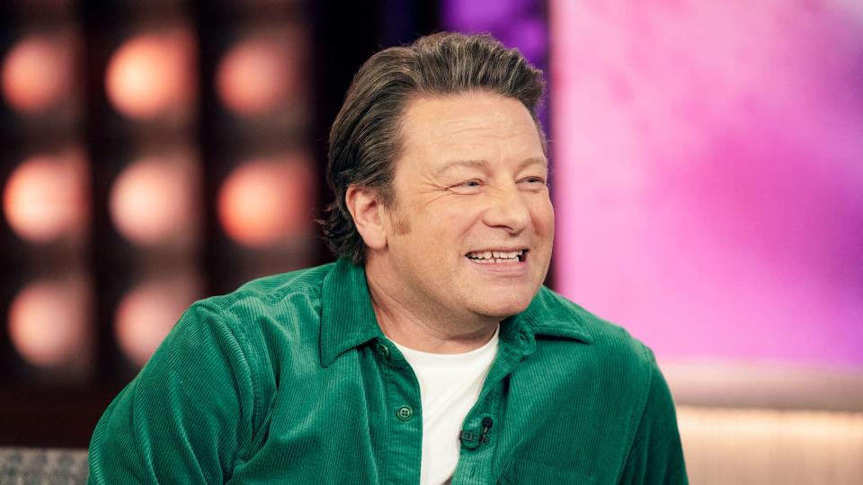 Jamie Oliver told Chris Moyles that he struggles to connect with his son River's parents. (NBCUniversal/Getty)