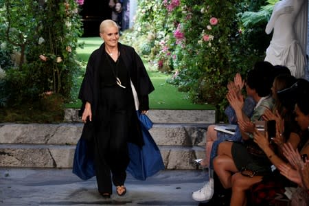 Designer Maria Grazia Chiuri appears at the end of her Haute Couture Fall/Winter 2019/20 collection show for fashion house Dior in Paris