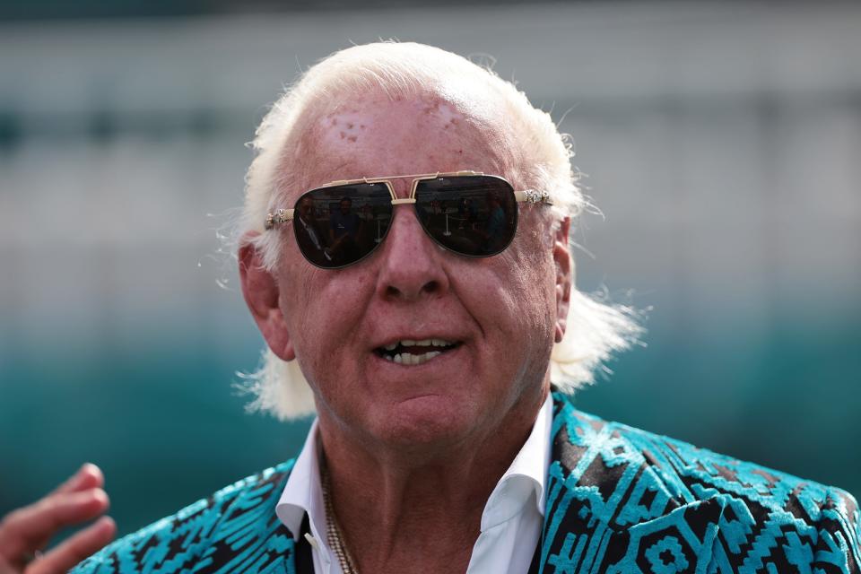 Former professional wrestler Ric Flair on the field before the game between the Jacksonville Jaguars and Houston Texans at TIAA Bank Field on December 19, 2021 in Jacksonville, Florida.