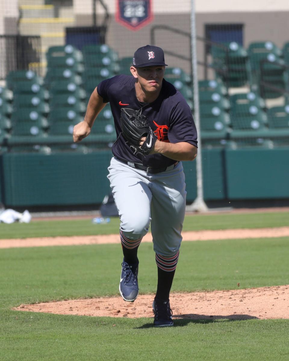 Detroit Tigers pitcher Franklin Perez fields ground balls Friday, Feb. 26, 2021, at Publix Field at Joker Marchant Stadium in Lakeland, Florida.