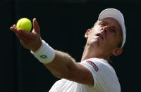 South Africa's Kevin Anderson serves to Pierre-Hugues Herbert of France during their Men's singles match during day one of the Wimbledon Tennis Championships in London, Monday, July 1, 2019. (AP Photo/Alastair Grant)