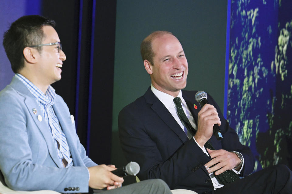 Britain's Prince William, right, takes part in a panel discussion on stage with Brandon Ng of Ampd Energy at the Earthshot+ Summit at Park Royal Pickering in Singapore, Wednesday, Nov. 8, 2023. William is on a four-day visit to Singapore, where he attended the Earthshot Prize that aims to reward innovative efforts to combat climate change. (Mohd Rasfan/Pool Photo via AP)