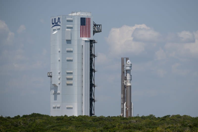 A United Launch Alliance Atlas V rocket with Boeing's CST-100 Starliner spacecraft aboard is rolled back to the Vertical Integration Facility to replace a pressure regulation valve on the Atlas V rocket, at Cape Canaveral Space Force Station in Florida on Wednesday. NASA Photo by Joel Kowsky/UPI
