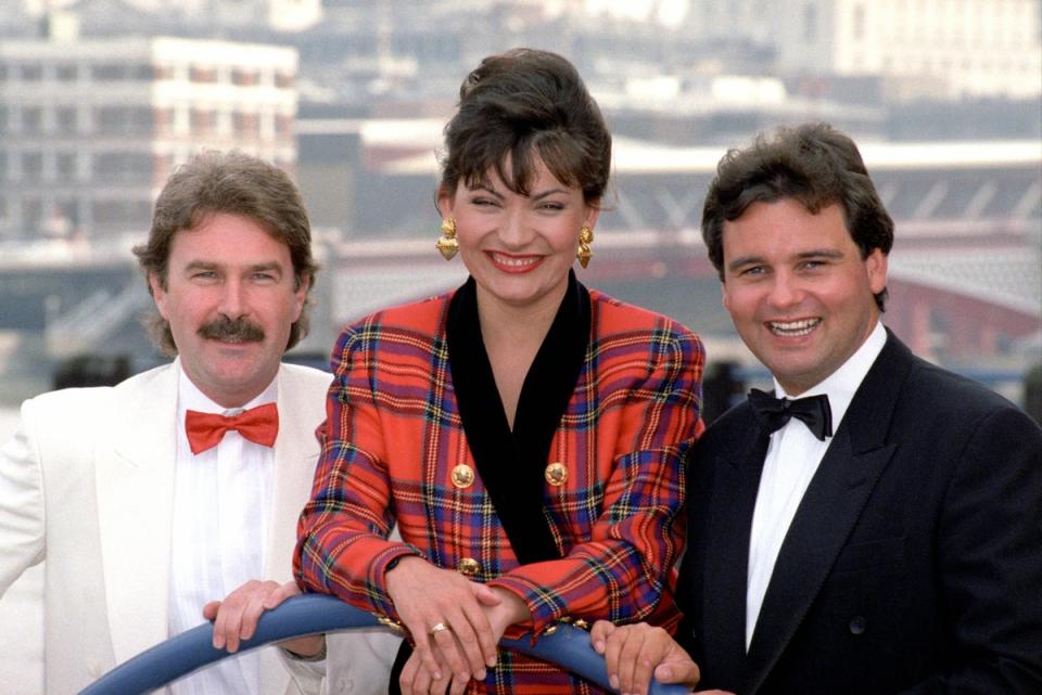 Kelly, pictured with ‘GMTV’ colleagues Michael Wilson and Eamonn Holmes, has been a fixture on ITV’s morning schedule for decades (PA)