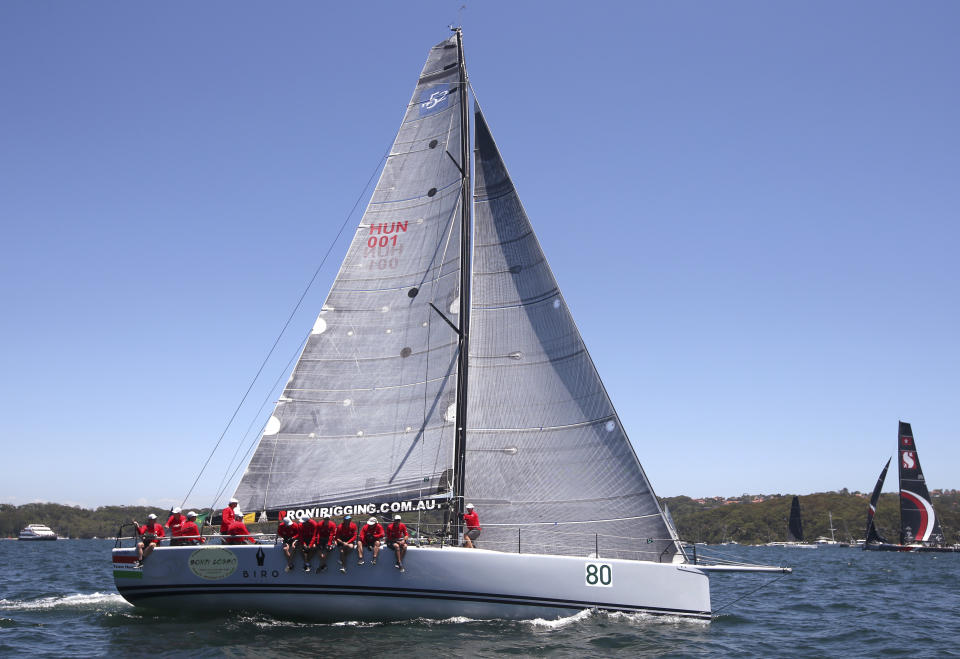 The M3 Team Hungary yacht prepares for the start of the Sydney Hobart yacht race in Sydney, Wednesday, Dec. 26, 2018. The 630-nautical mile race has 85 yachts starting in the race to the island state of Tasmania. (AP Photo/Rick Rycroft)