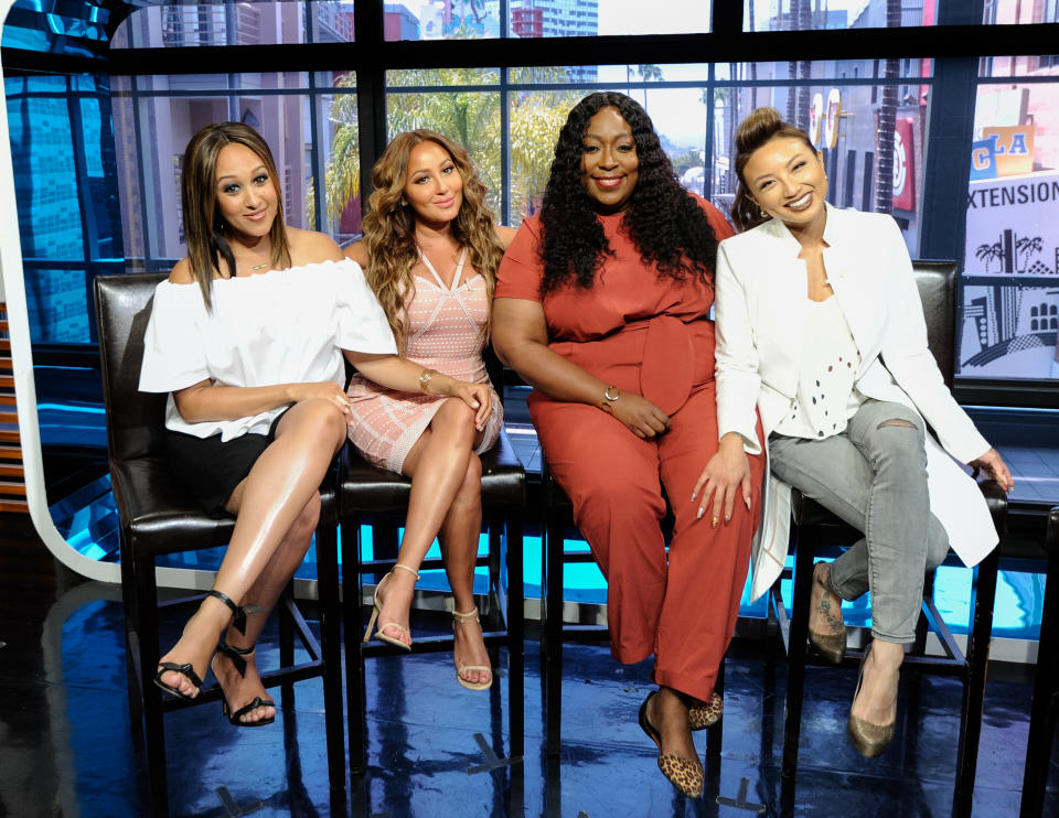 Tamera Mowry-Housley, Adrienne Bailon, Loni Love and Jeannie Mai (Noel Vasquez / Getty Images)