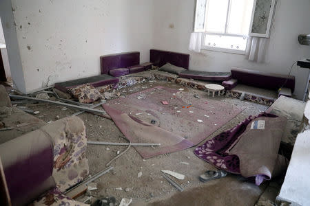 The inside of a house damaged by shelling during the fighting between the eastern forces and internationally recognized government is pictured in Abu Salim in Tripoli, Libya April 15, 2019. REUTERS/Hani Amara