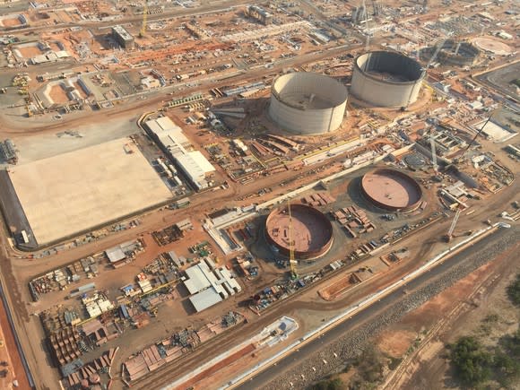 LNG storage tanks under construction.