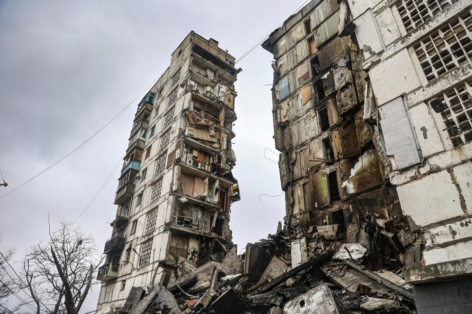 FILE - A building damaged during fighting is seen in Mariupol, Ukraine, on April 13, 2022. Unbroken by a Russian blockade and relentless bombardment, the key port of Mariupol is still holding out, a symbol of staunch Ukrainian resistance that has thwarted the Kremlin's invasion plans. (AP Photo/Alexei Alexandrov, File)