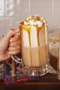 <p>For your adult Harry Potter parties.</p><p>Get the recipe from <a href="https://www.delish.com/cooking/recipe-ideas/recipes/a55804/boozy-butterbeer-punch-recipe/" rel="nofollow noopener" target="_blank" data-ylk="slk:Delish;elm:context_link;itc:0;sec:content-canvas" class="link ">Delish</a>.</p>