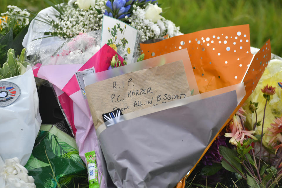 Messages on floral tributes at the scene, where Thames Valley Police officer Pc Andrew Harper, 28, died following a "serious incident" at about 11.30pm on Thursday near the A4 Bath Road, between Reading and Newbury, at the village of Sulhamstead in Berkshire.