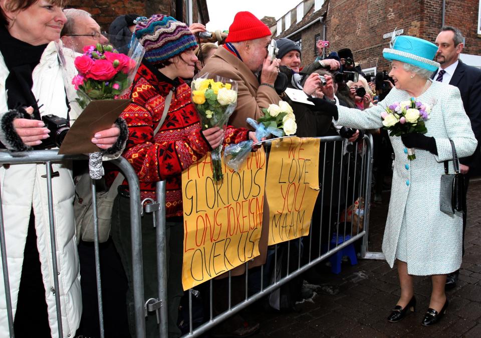 NORFOLK, ENGLAND - FEBRUARY 6: Queen Elizabeth II is greeted by wellwishers during a visit to Kings Lynn Town Hall on February 6, 2012 in Norfolk, England. Today is Accession Day, with the Queen celebrating 60 years to the day since she became Monarch. (Photo by Chris Radburn - WPA Pool/Getty Images)
