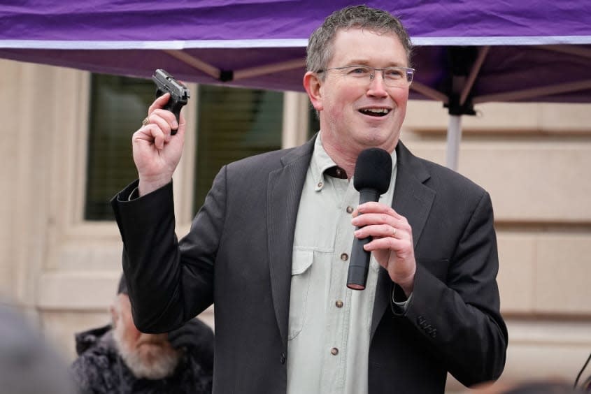 Thomas Massie with a gun