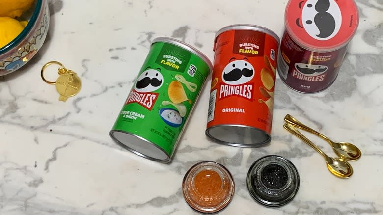 Opening caviar jar and Pringles cans