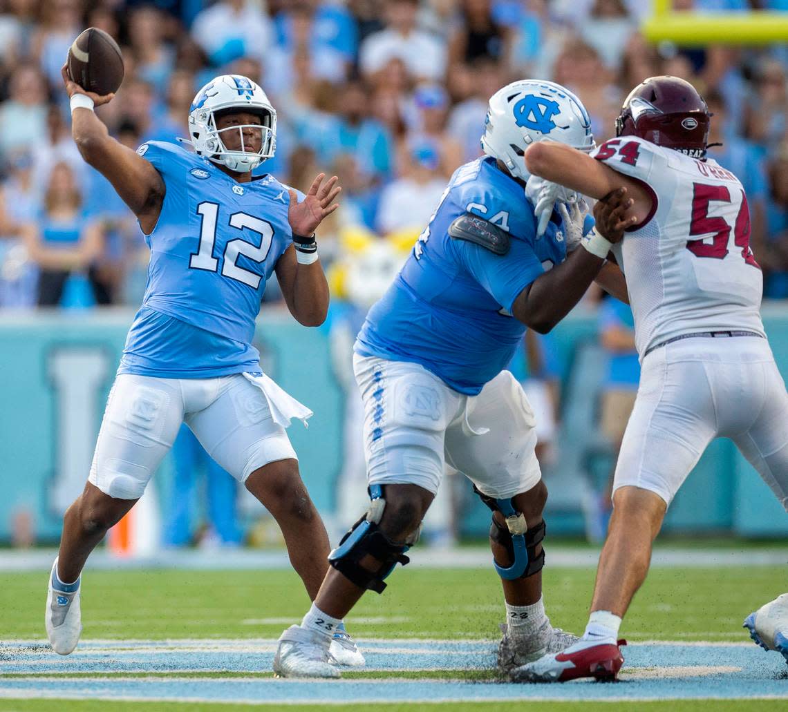 North Carolina quarterback Jacolby Criswell (12) looks for a receiver in the second quarter against N.C. Central on Saturday, September 14, 2024 at Kenan Stadium in Chapel Hill, N.C. Criswell was put into the game replacing starter Conner Harrell. Criswell passed for 161 yards and one touchdown.