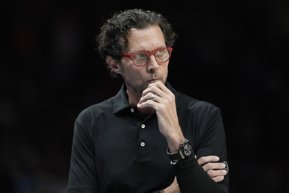 Atlanta Hawks head coach Quin Snyder watches from the bench during the first half of an NBA basketball game against the Cleveland Cavaliers Wednesday, March 6, 2024, in Atlanta. (AP Photo/John Bazemore)