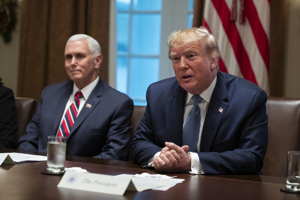 Vice President Mike Pence listens as President Donald Trump speaks during a roundtable on school choice in the Cabinet Room of the White House, Monday, Dec. 9, 2019, in Washington. (AP Photo/ Evan Vucci)