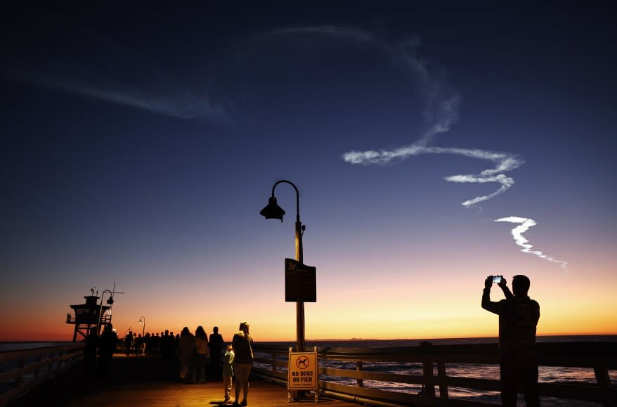 SpaceX Falcon 9 rocket launching 22 Starlink satellites into space, seen from San Clemente, California.