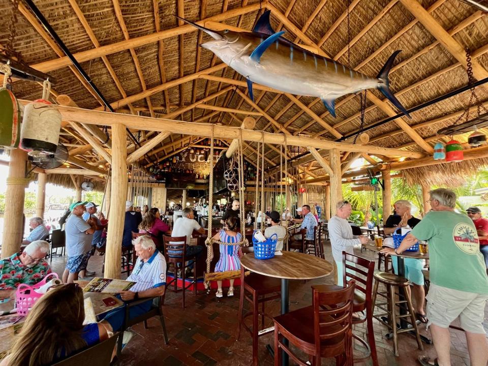 Yucatan Waterfront's outdoor swing bar and tiki is a new addition to the Matlacha bar & grill.