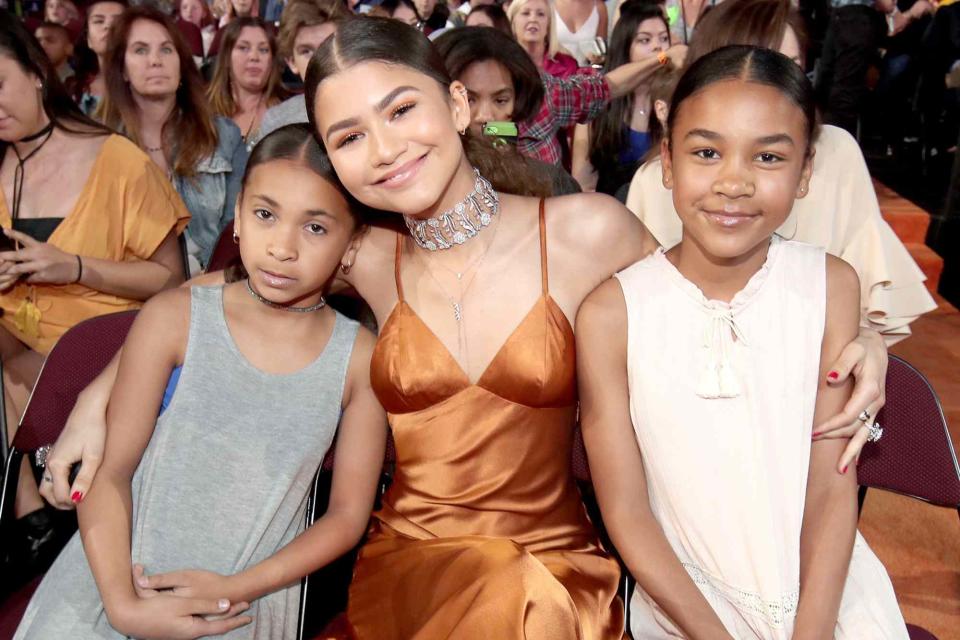 <p>Chris Polk/KCA2017/Getty</p> Zendaya and her nieces attend Nickelodeon