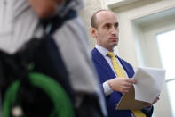 President Donald Trump's White House Senior Adviser Stephen Miller stands in the Oval Office of the White House during a law enforcement briefing on the MS-13 gang, Wednesday, July 15, 2020, in Washington. (AP Photo/Patrick Semansky)