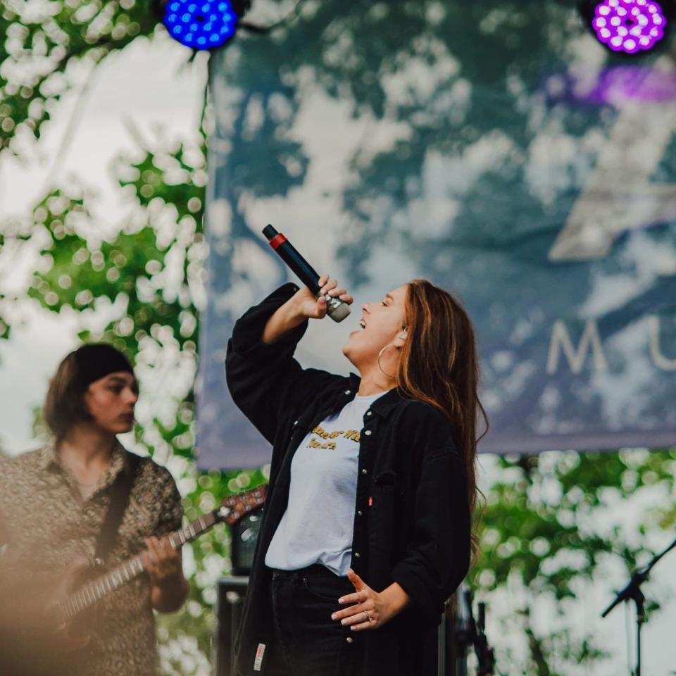 A singer is shown at a previous Alive Music Festival. The event is marking its 35th year. Concerts start Thursday night and run through Sunday.