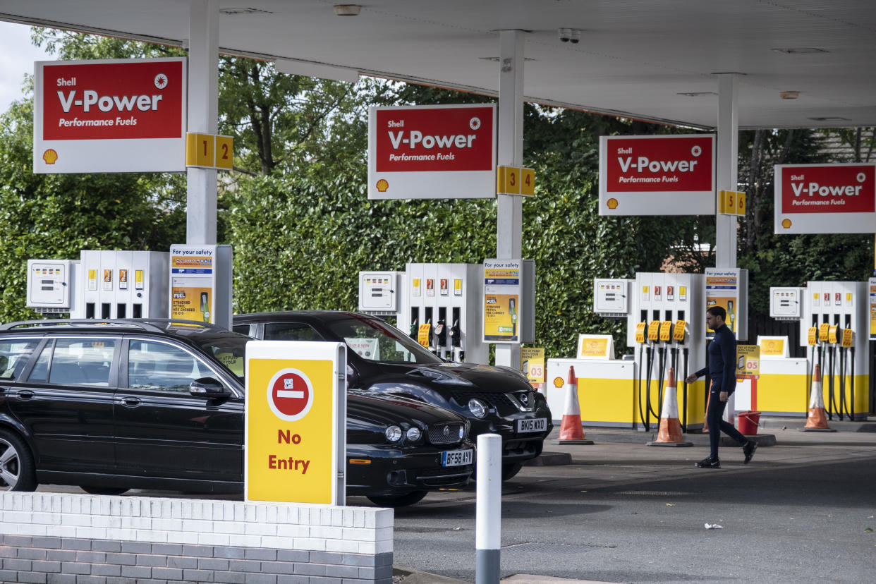 As the fuel crisis in the UK continues, this Shell petrol station is open for business, and motorists drive in with their cars to fill up with fuel, which is being sold at normal prices on 29th September 2021 in Birmingham, United Kingdom. While some forecourts remain closed with little or no fuel, there is confusion amongst the public as to whether they should buy fuel now or wait. This has led to panic buying and long queues outside some petrol stations as the crisis, which has been caused by a lack of HGV drivers available to deliver supplies, continues. (photo by Mike Kemp/In Pictures via Getty Images)