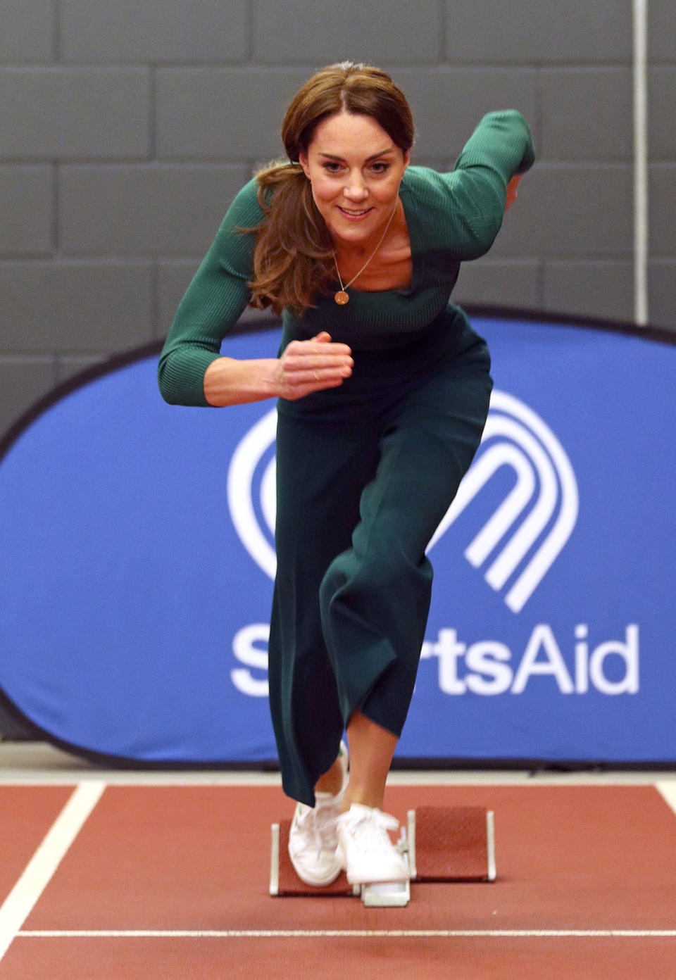 Britain's Catherine, Duchess of Cambridge, tries out the running track with starting blocks during a SportsAid event at the London Stadium in east London on February 26, 2020. (Photo by Yui Mok / POOL / AFP) (Photo by YUI MOK/POOL/AFP via Getty Images)