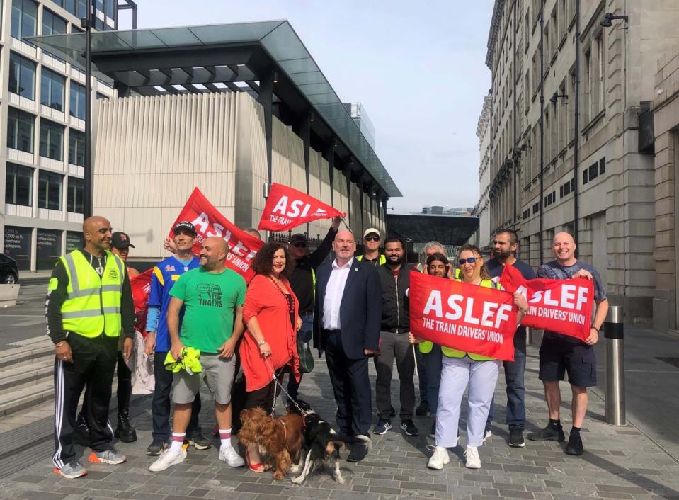 Mick Whelan (centre in suit), general secretary of Aslef, joins the picket line outside Paddington train station in London (Maighna Nanu/PA) (PA Wire)