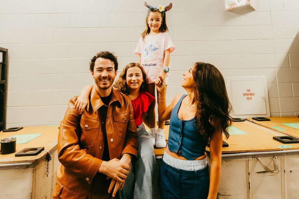 <p>Ashley Gellman</p> Kevin and Danielle Jonas with their two daughters on tour. 