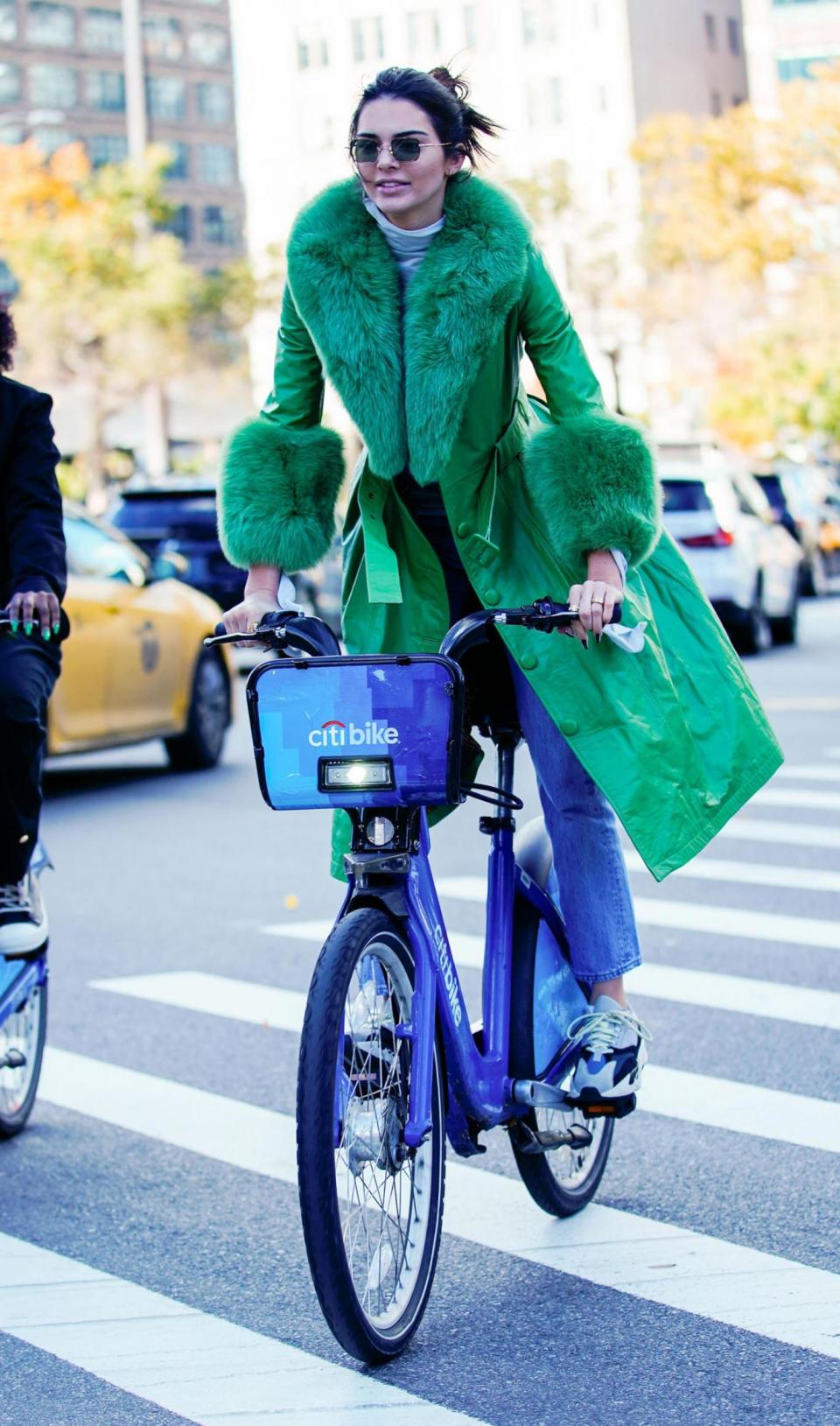 Kendall Jenner wears the Saks Potts green coat on her birthday (Jackson Lee / SplashNews.com)