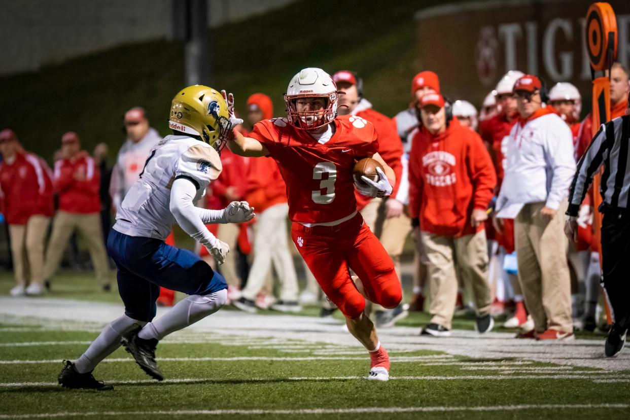 Chase Flaherty of Beechwood (3) runs after the catch in the KHSAA Class 2A state semifinal between Lloyd Memorial and Beechwood high schools Friday, Nov. 25, 2022.