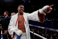 Boxing - Anthony Joshua vs Joseph Parker - World Heavyweight Title Unification Fight - Principality Stadium, Cardiff, Britain - March 31, 2018 Anthony Joshua celebrates after winning the fight Action Images via Reuters/Andrew Couldridge