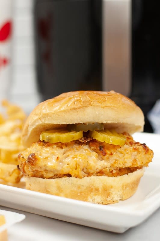 <p>Savor and Savvy</p><p>This addictive 12-minute Air Fryer Copycat Chick-fil-A Sandwich is brined, battered and cooked to crispy perfection.</p><p><strong>Get the recipe:</strong> <a href="https://savorandsavvy.com/air-fryer-copycat-chick-fil-a-sandwich/" rel="nofollow noopener" target="_blank" data-ylk="slk:Air Fryer Copycat Chick-fil-A Sandwich;elm:context_link;itc:0;sec:content-canvas" class="link "><strong>Air Fryer Copycat Chick-fil-A Sandwich</strong></a></p>