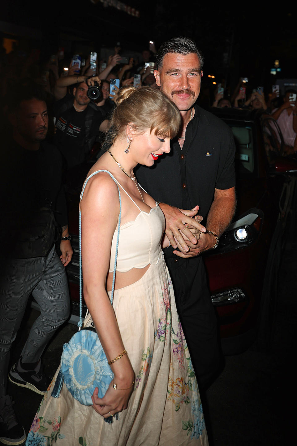 Taylor Swift and Travis Kelce are seen on Sept. 7 in New York, floral, Zimmermann, Karen Elson, wedding, coquette