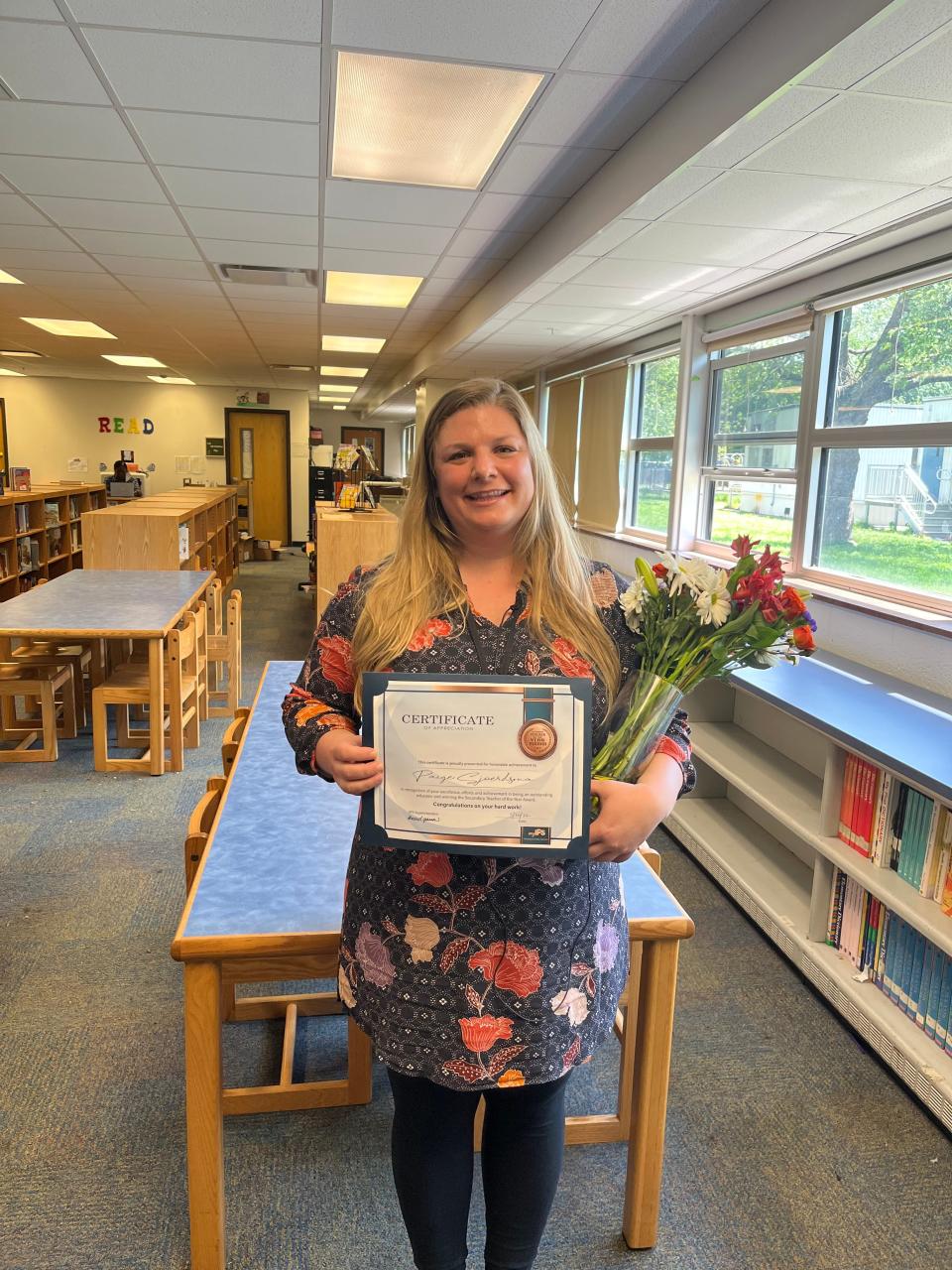 Paige Sjoerdsma, a seventh and eighth grade English teacher at Butler Lab School 55, was chosen as the secondary Teacher of the Year for Indianapolis Public Schools.