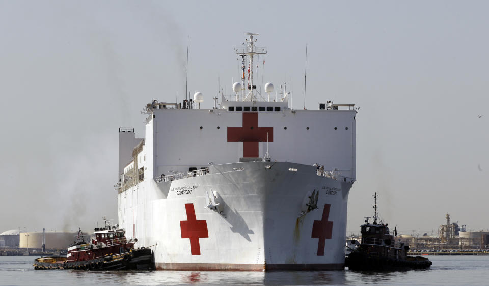 FILE - In this March 19, 2010 file photo, the Navy hospital ship USNS Comfort returns to port, in Baltimore, after providing disaster relief operations following the earthquake in Haiti. The Comfort will be on Colombia’s Caribbean coast starting on Oct. 11, 2018, to assist in treating thousands of Venezuelan refugees that have crossed the border, fleeing Venezuela’s political, social and economic crisis and help relieve the pressure on Colombia’s medical systems (AP Photo/Rob Carr, File)