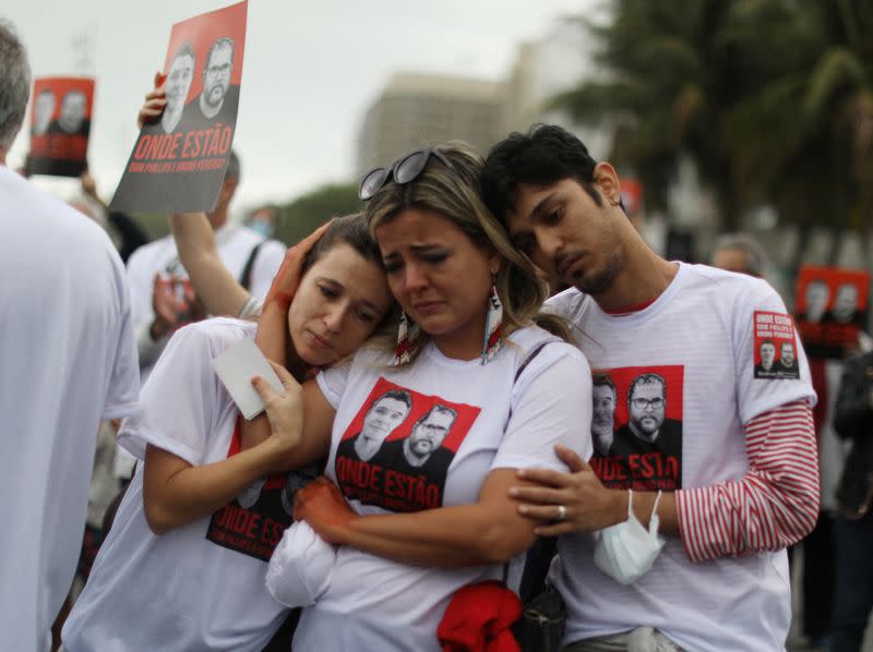 Families and friends of missing journalist and indigenous expert demand answers from Brazilian authorities in Rio de Janeiro