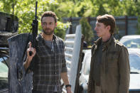 <p>Ross Marquand as Aaron and Jordan Woods-Robinson as Eric in AMC’s <i>The Walking Dead</i>.<br>(Photo: Gene Page/AMC) </p>