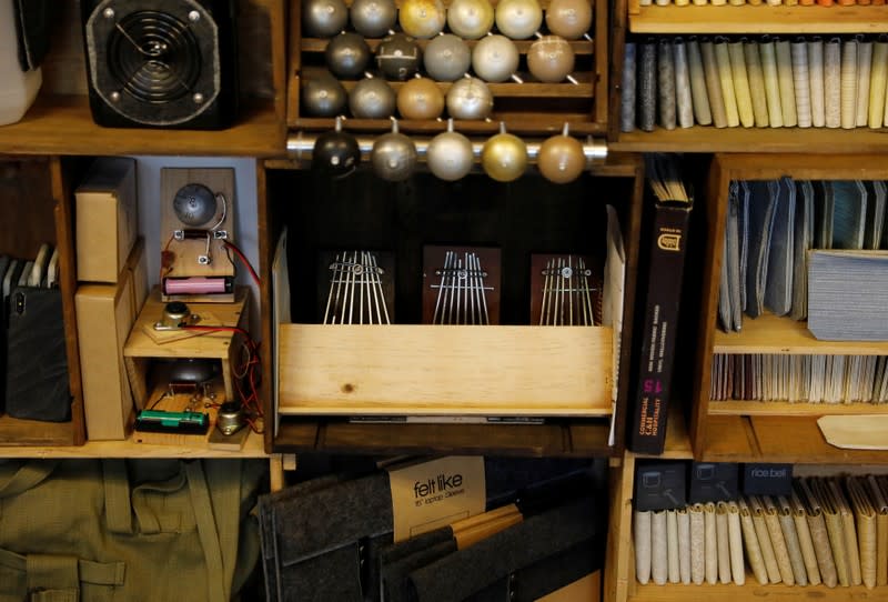 Thumb pianos are kept with other art work of Kevin Cheung, an upcycling product designer, at his house in Hong Kong