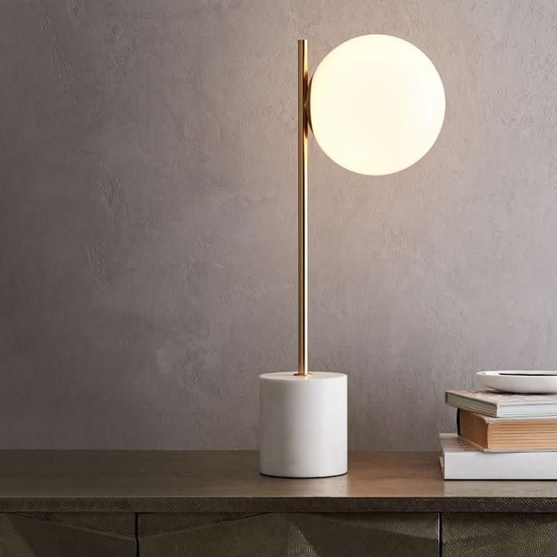 <p><a href="https://karenjaihome.com/collections/lighting/products/lukloy-nordic-modern-minimalist-led-table-lamps-for-living-room-white-glass-ball-table-light-iron-marble-desk-light-studying" rel="nofollow noopener" target="_blank" data-ylk="slk:Shop Now;elm:context_link;itc:0;sec:content-canvas" class="link ">Shop Now</a></p><p>Mito Lamp</p><p>$158.00</p><p>karenjaihome.com</p>