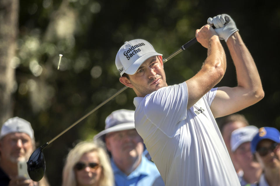 Patrick Cantlay watches his drive down the ninth fairway during the final round of the RBC Heritage golf tournament, Sunday, April 17, 2022, in Hilton Head Island, S.C. (AP Photo/Stephen B. Morton)