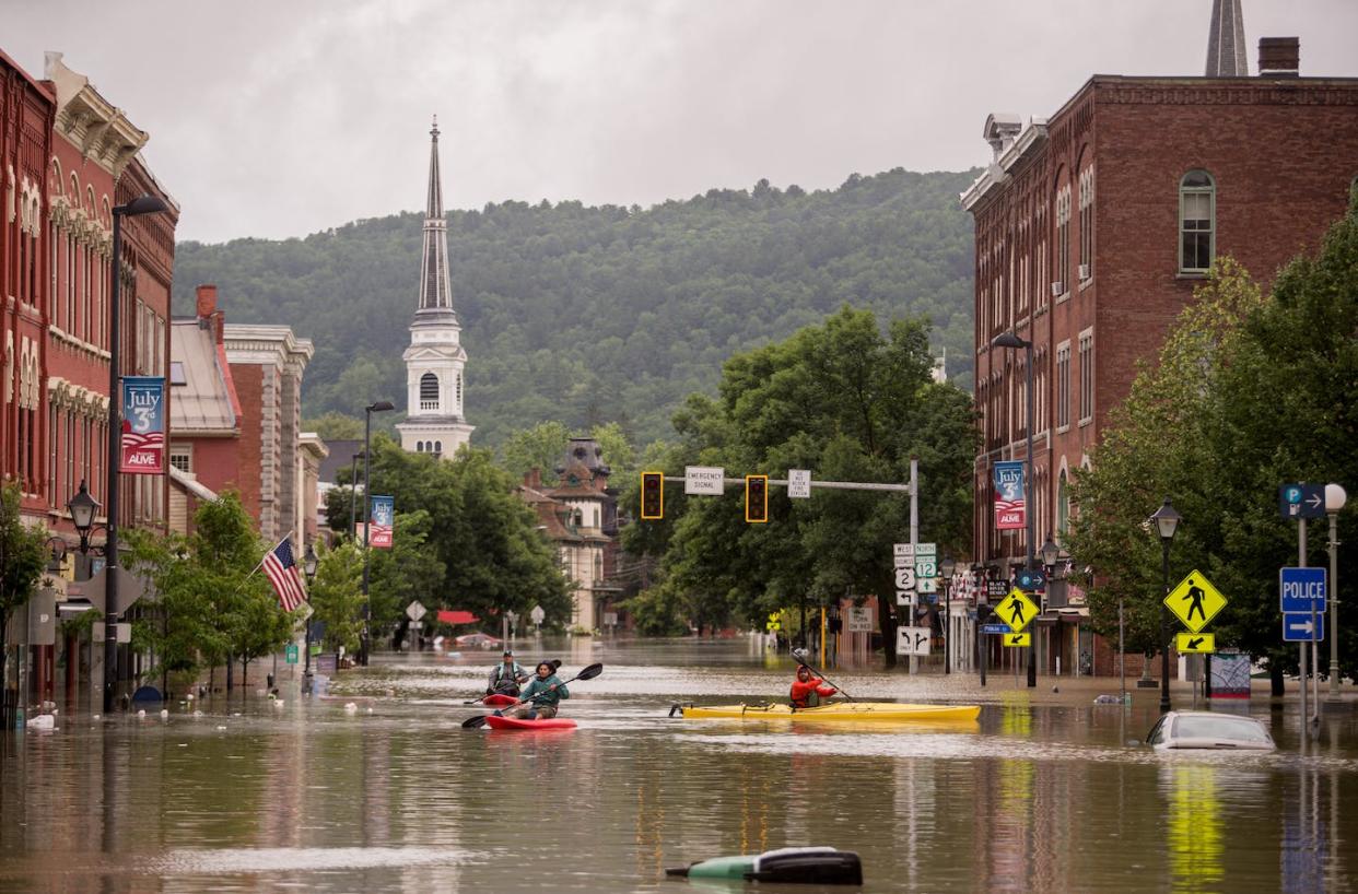 Extreme downpours filled downtown Montpelier, Vt., with water in July 2023. <a href="https://www.gettyimages.com/detail/news-photo/flooding-in-downtown-montpelier-vermont-on-tuesday-july-11-news-photo/1526471549" rel="nofollow noopener" target="_blank" data-ylk="slk:John Tully for The Washington Post via Getty Images;elm:context_link;itc:0;sec:content-canvas" class="link ">John Tully for The Washington Post via Getty Images</a>