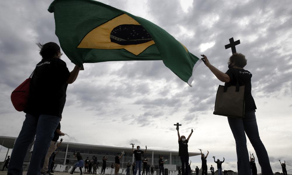 <span>Photograph: Eraldo Peres/AP</span>