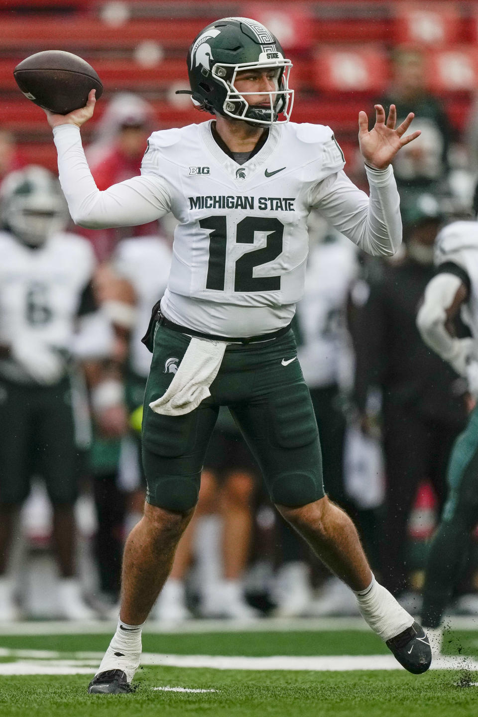 Michigan State quarterback Katin Houser (12) throws a pass during the first half of an NCAA college football game against Rutgers, Saturday, Oct. 14, 2023, in Piscataway, NJ. (AP Photo/Bryan Woolston)