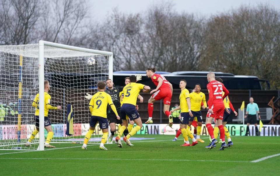 Will Keane scores his side's first goal of the game during the Sky Bet League One match against Oxford last month - Tess Derry/PA Wire