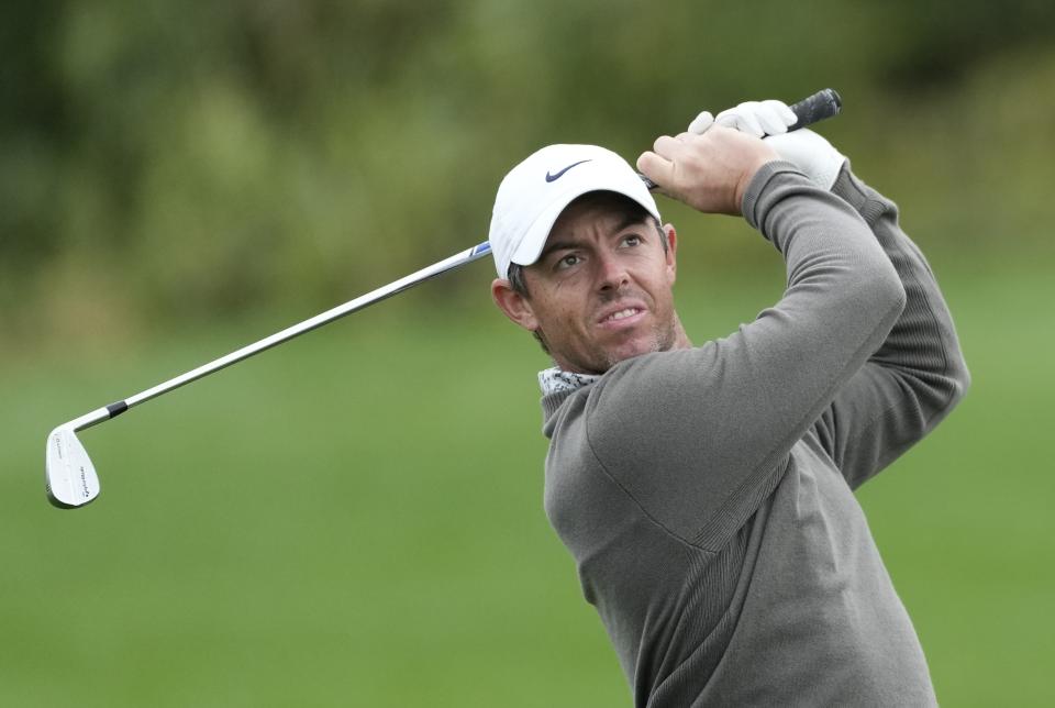 Rory McIlroy of Northern Ireland plays his second shot on the 9th hole during the completion of his first round on Day Two of the Dubai Desert Classic, in Dubai, United Arab Emirates, Friday, Jan. 27, 2023. (AP Photo/Kamran Jebreili)