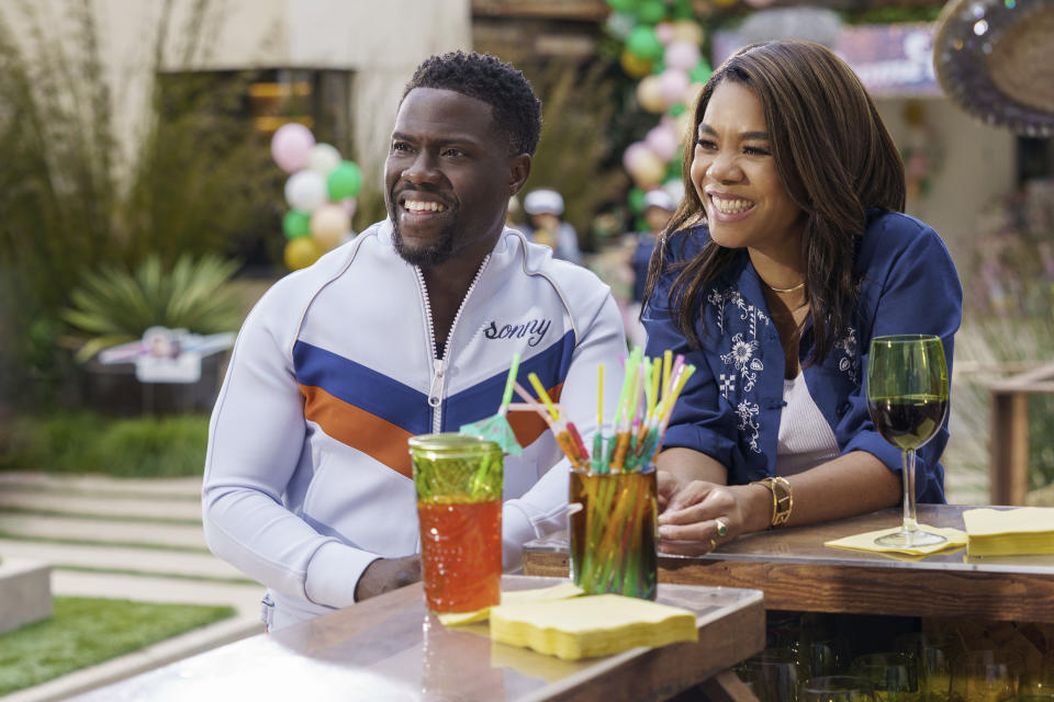 This image released by Netflix shows Kevin Hart and Regina Hall in "Me Time." (Saeed Adyani/Netflix via AP)